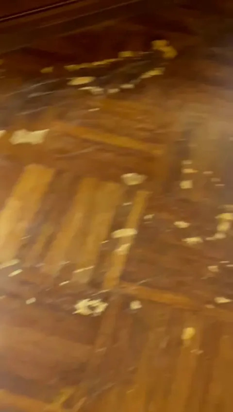 Herringbone floor with old flooring and debris during the job in a Sheepshead Bay, Brooklyn house