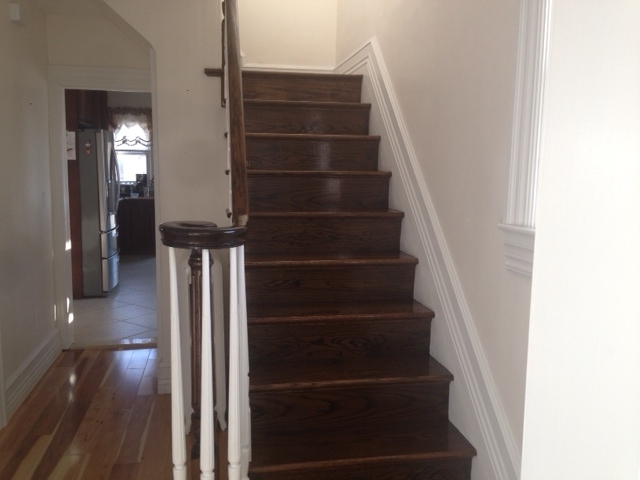 finished-wood-stairs-rails-installation